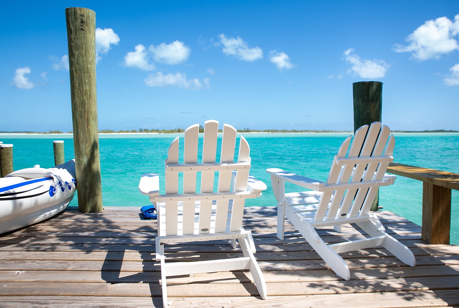 Bootssteg sunchairs Bakari house Great Exuma Bahamas