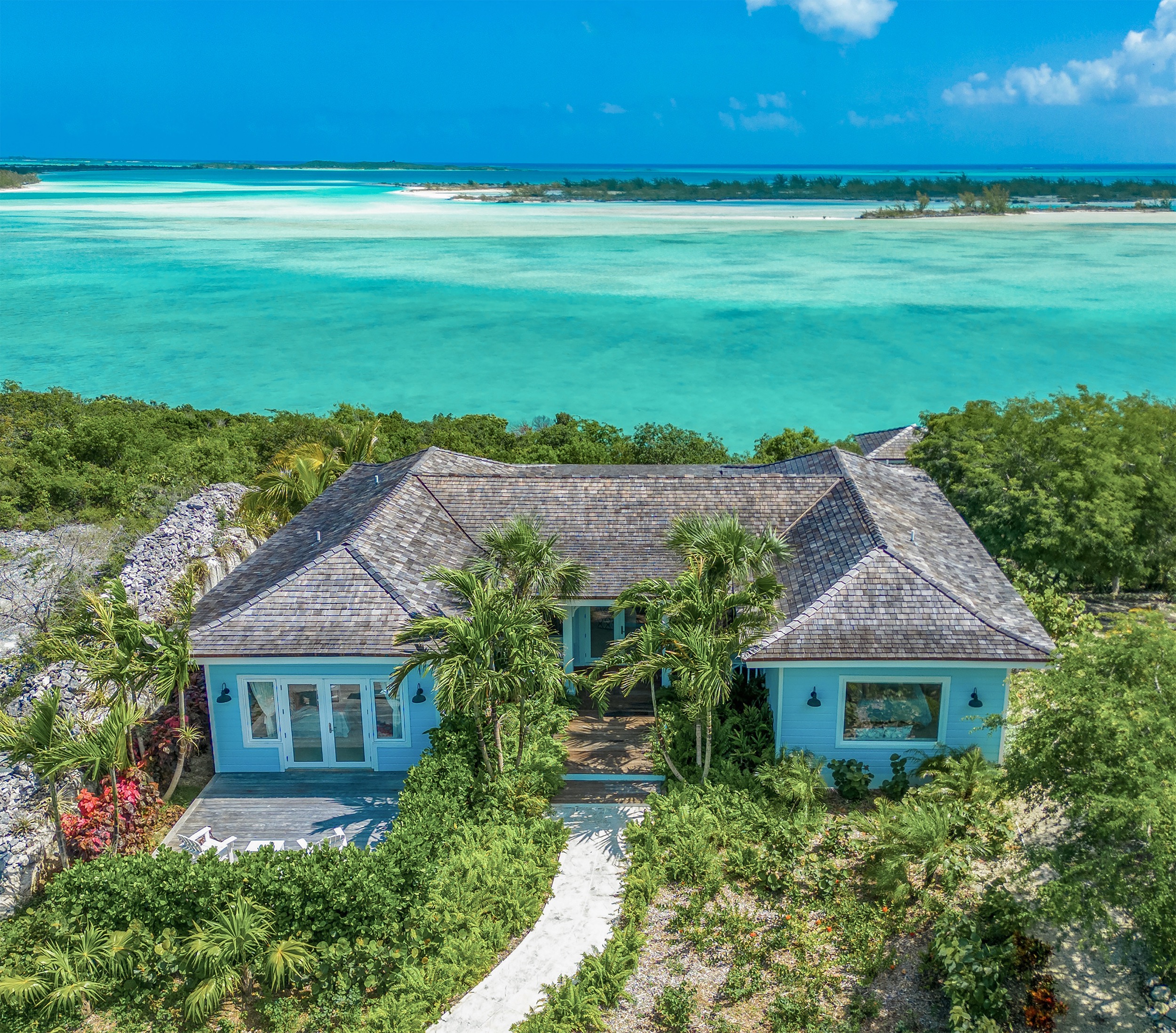 amani house bahamas drone shot ocean in background